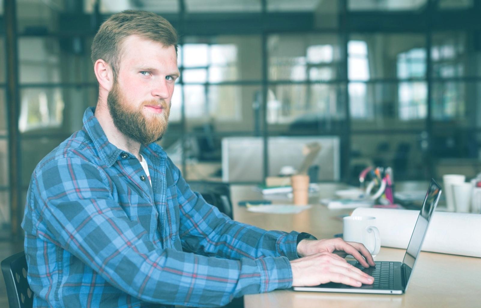 Team members testing mobile applications on various devices